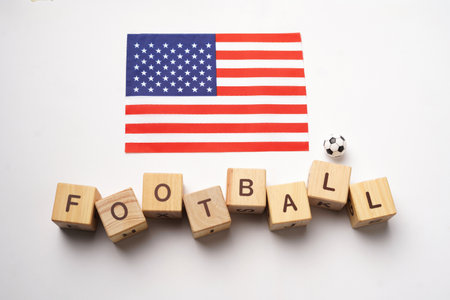 United States flag with football title and white background. football conceptの写真素材