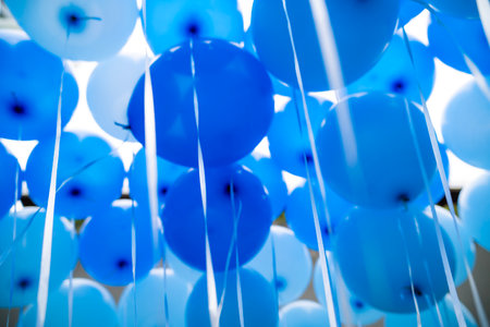 abstract blue balloons -birthday boy, celebration and party decoration concepの写真素材