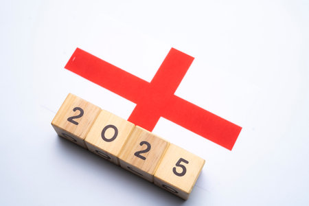 2025, England flag with date block, Concept, Important events for England the new year, election, economy, social activities, central bank, England foreign policyの写真素材