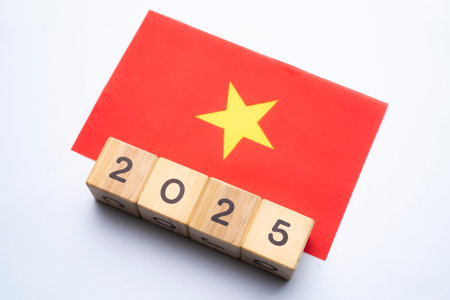 2025, Vietnam, Vietnam flag with date block, Concept, Important events for Vietnam in the new year, election, economy, social activities, central bank, Vietnam foreign policyの写真素材