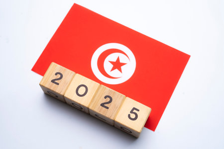 2025, Tunisia flag with date block, Concept, Important events for Tunisia the new year, election, economy, social activities, central bank, Tunisia foreign policyの写真素材