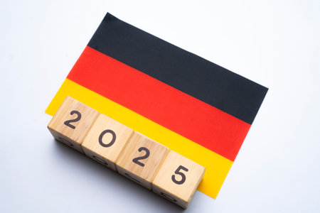 2025, Germany flag with date block, Concept, Important events for Germany the new year, election, economy, social activities, central bank, Germany foreign policyの写真素材