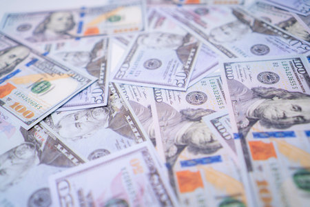 Scattered United States Dollar Bills Background Texture