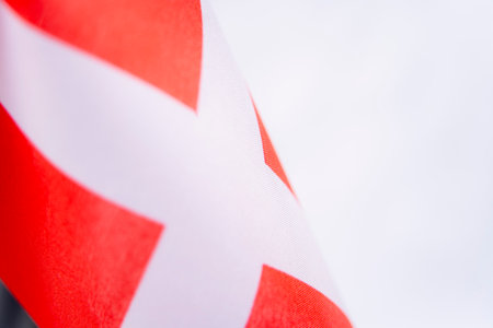 Close Up Swiss Flag Fabric Texture Background