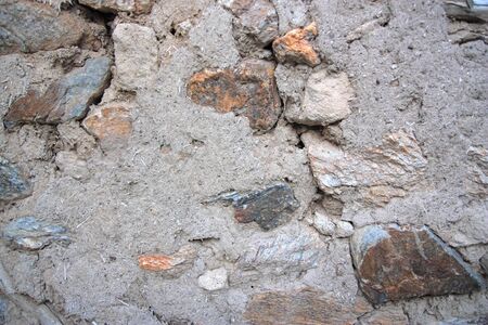 Old stone and mud wall background horizontalの写真素材