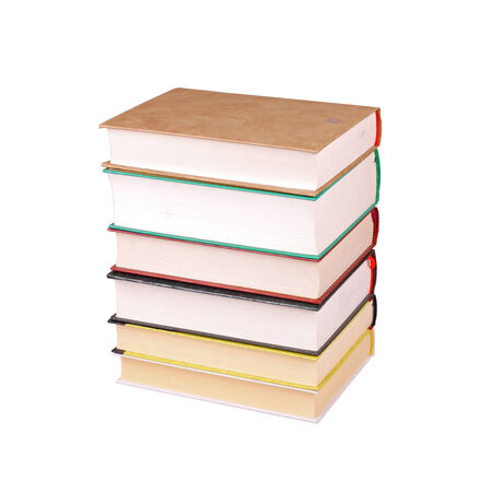 Stack of old books isolated on whiteの写真素材
