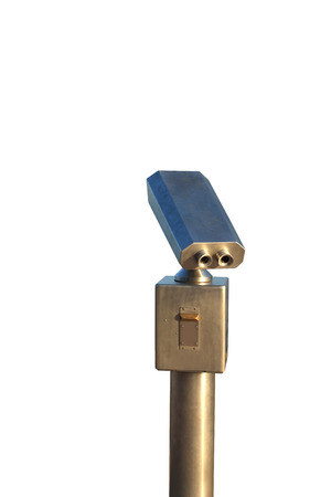 Metallic coin operated viewer for tourists to look at against coastal. Isolated on white background with clipping pathの写真素材