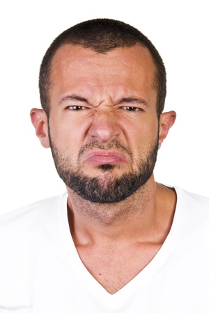 Young man expressing disgustの写真素材