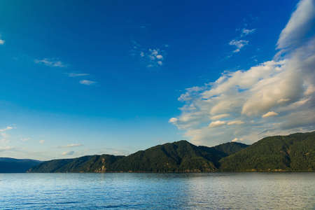 Sky over the lake Teletskoye Altaiの写真素材