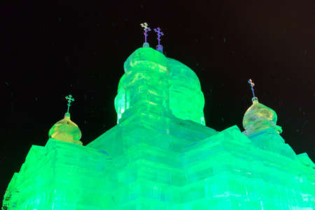 Russia, Moscow, January 07, 2020: festival Frozen Moscow, Victory Park, ice Cathedral of Christ the Savior with color illuminationのeditorial素材