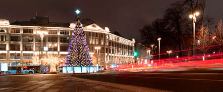 Russia, Moscow, January 07, 2020: Slavyanskaya Square, Christmas tree in the center of Moscow, evening festive cityのeditorial素材