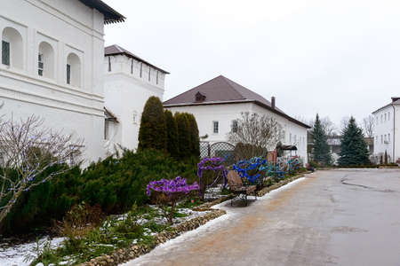Russia, Borovsk, January 02, 2020: St. Pafnutiev Borovsky Monastery, a territory with churches, a shop, a cafe and New Year's decorated Christmas treesのeditorial素材