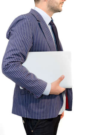 Side of businessman with laptop isolated on white backgroundの写真素材