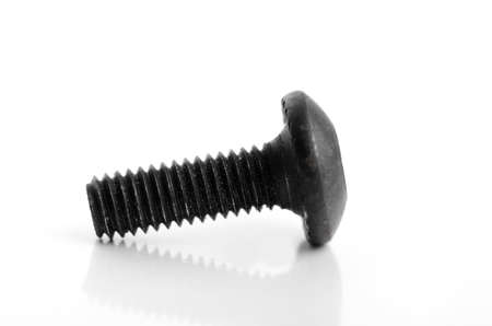 Black screw bolt isolated on white backgroundの写真素材