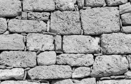 Ruins of atique stone wall backgroundの写真素材