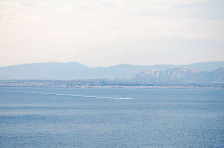 View of Ionian sea and Corinthian port and yacht tracks in waterの写真素材