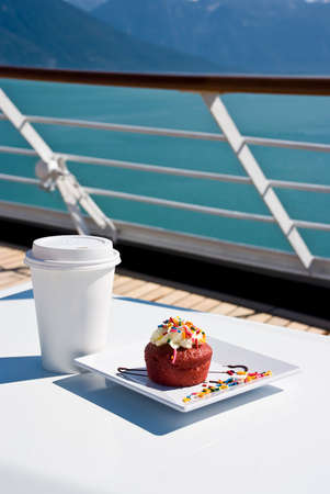 Alaska - Enjoy Haines - Delight With A Cupcake And Hot Drink On The Deck Of Cruise Ship - Travel...