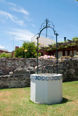 Uruguay - Colonia Del Sacramento - Water Well With Traditional Portuguese Ceramic Decorationsのeditorial素材