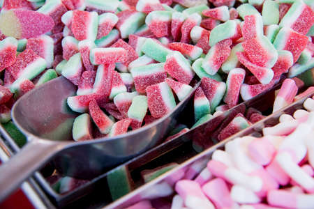 Jelly sugar candies - Multicoloured background made of various colourful candiesの写真素材
