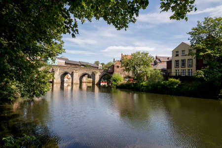 View of the Elvet Bridge across the River Wear in the city of Durham in north east England - United Kingdomのeditorial素材