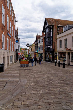 Winchester city centre. High Street shoppers in the pedestrian zone - England - United Kingdom. Phototaken on 6th of May 2019のeditorial素材