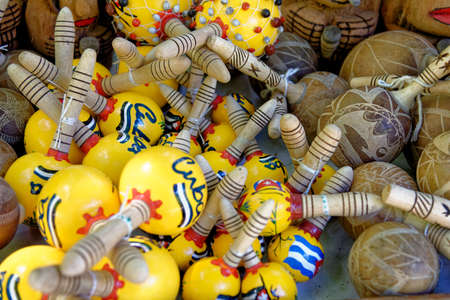 Decorated maracas Souvenirs from CUBA made from gourds for sale on a stall at the Street Matket -...