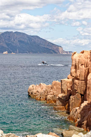 Beach of Rocce Rosse, red porphyry rocks of Arbatax, Tortoli, Ogliastra province, Sardinia, Italy, Europe - 18th of May 2019のeditorial素材
