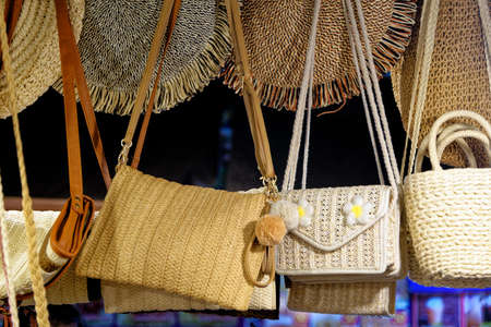 Beautiful lady handbags and basketry displayed in Ao Nang Night street market - Thailandの写真素材