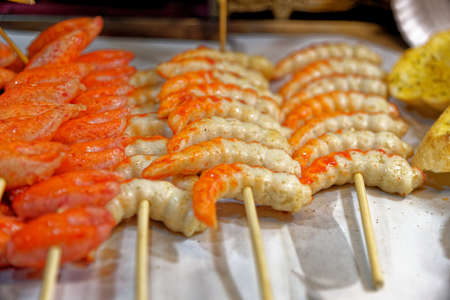 Fresh grilled shrimps on stick in the fishing market in Ao Nang - Thailand Southeast Asia