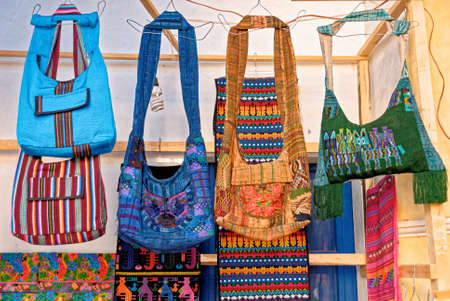 Cloth bags souvenirs display in artisan market Antigua - Guatemalaのeditorial素材