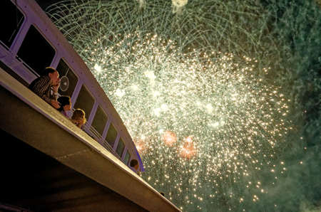 Fireworks Extravaganza over Hamburg Harbor - Happy people watching fireworks - Hamburg, Germany 18th...