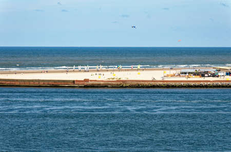 IJMUIDEN, THE NETHERLANDS March 4th, 2012. Kite surfers enjoying the wind and waves of the little...