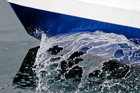 Boat Wave ocean trace on blue sea fresh water background. Deep ocean water surface trail bubble...