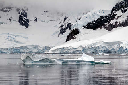 Cruising in Antarctica - Antarctic Peninsula - Palmer Archipelago. Neumayer Channel. Global warming - Fairytale landscapeの写真素材