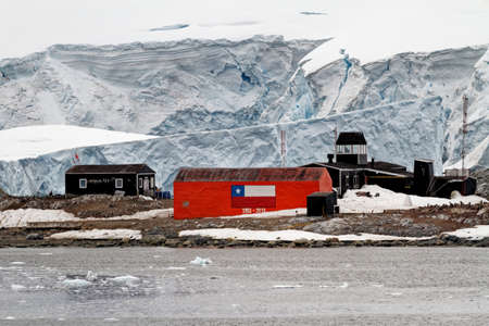 View of the Chilean Station Gonzales Videla, on the Antarctic mainland's Waterboat Point in Paradise Bay - Antarcticaの写真素材