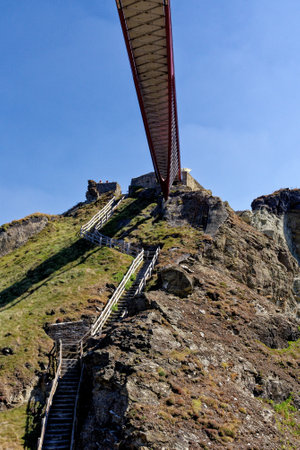 The Tintagel Bridge opened in 2019 connects the mainland with the island where the Arthurian Legend of Camelot was imagined. Tintagel castle, Cornwall, England, United Kingdom - 12th of August 2022のeditorial素材