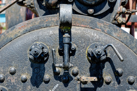 Detail of old rusty steam locomotives at the seaside promenade in Castro City, Chiloe Island, Chile. 16th of February 2014の写真素材