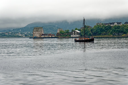 Viking Longboat Replica sailing in Alesund town and municipality in More og Romsdal county, Norway. Travel destination North of Europe. 19th of July 2012のeditorial素材
