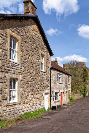 Landscape of the Village of Nunney in a sunny day, Somerset, England, United Kingdom - 8th of April 2023のeditorial素材