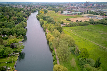 Aerial view across the River Thames showing Caversham and surrounding countryside of Reading,...