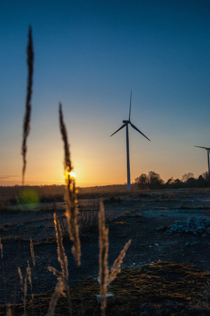The image of windmill, sunset, energy
