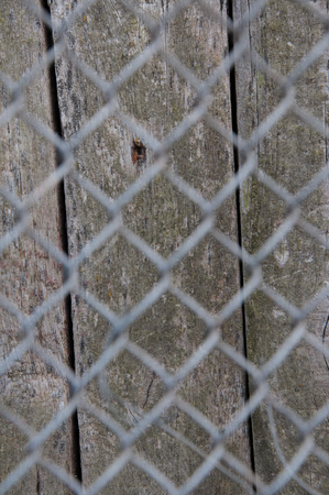 Metal grid and wooden board texture