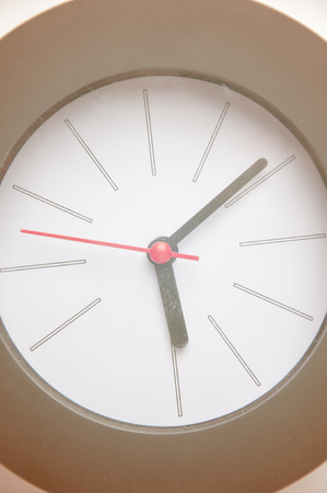 Black clock isolated on a white background