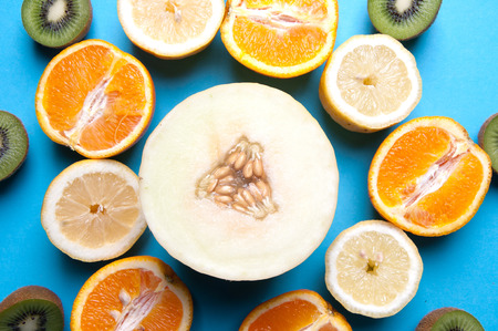 Healthy fruits on a blue background from above