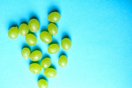 Balls of grapes as a background from above