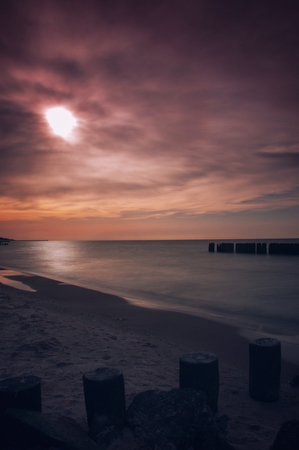 Seascape with breakwaters. vintege landscape polish sea shore. Scary blurry skyの写真素材