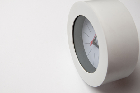 Black clock isolated on a white background