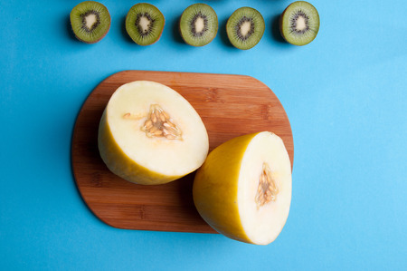 Healthy fruits on a blue background from above