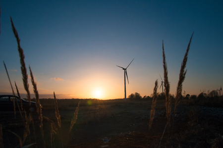 The image of windmill, sunset, energy