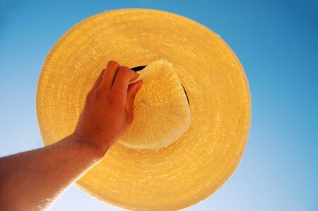 Hat obscures the sun.の写真素材